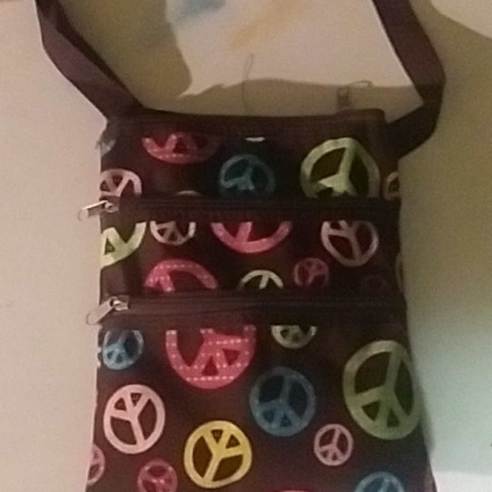 Beautiful cross bag with 'Peace Signs' on it